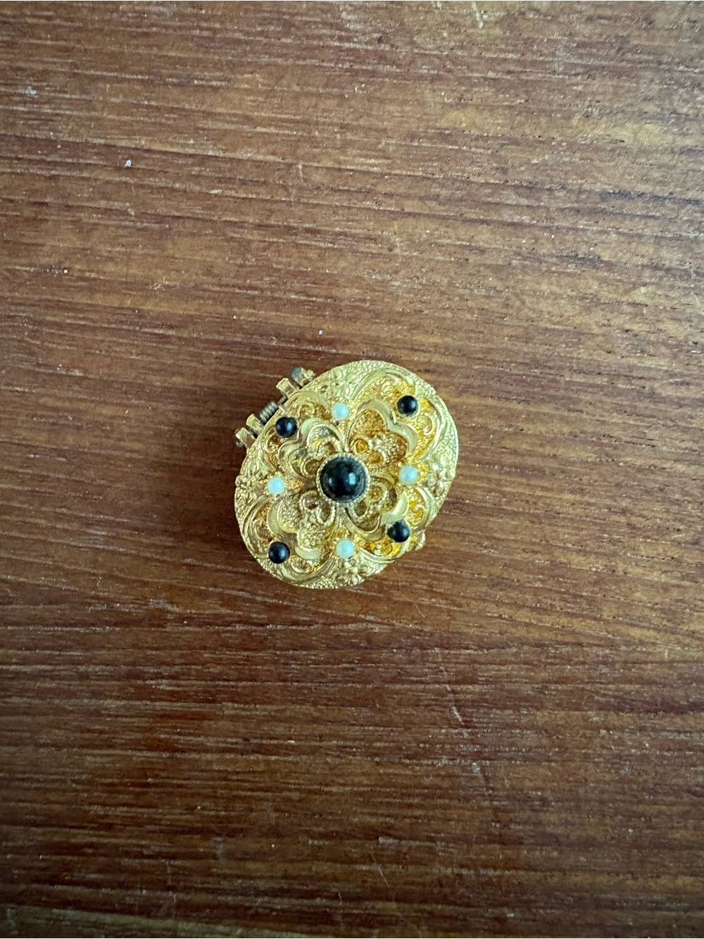 Vintage Gold-Tone Floral Filigree Pillbox with Black and Pearl Accents